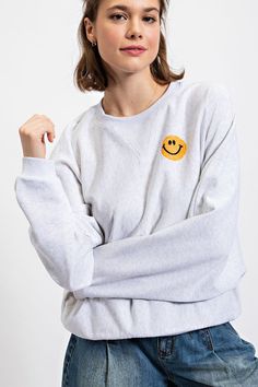 Stay cozy and keep it cute in the Evie Smiley Sweatshirt! With its playful graphic of a smiley faces, this sweat won't just keep you warm, it'll keep you smilin' too! Yayyyy!!! Smiley Sweatshirt, Smiley Faces, Boutique Homes, Stay Cozy, Smiley Face, Text Color, Sales Gifts, Smiley, Round Neckline