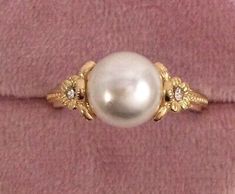 https://jewelrysalehub.com The beautiful Pearl is 8.5 mm wide. note: the inner band of the ring is silver. (this is a small ring size). ring size L. A stunning Ring,in excellent condition. Rings Engagement Pearl, Simple Pearl Engagement Ring, Engagement Rings Pearls, Wedding Ring Beautiful, Engagement Rings With Multiple Diamonds, Dream Engagement Rings Dream Engagement Rings Unique, Artisan Engagement Rings, 1800s Ring, Gold Ring Vintage