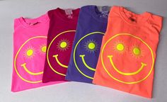 Welcome to Cotton and Pearls Vinyl!!  The tee screams summer!!  This unisex fit short sleeve comfort colors shirt will come with the yellow puff vinyl happy face  design on your color choice. Color chart is pictured above. All designs are hand pressed with professional grade heat transfer vinyl.  Please leave shirt color in the personalization box Small- 4x available Short Sleeve T-shirt With Heat Transfer Vinyl For Summer, Fun Smiley Face Short Sleeve T-shirt, Casual Summer T-shirt With Heat Transfer Vinyl, Spring Smiley Face Short Sleeve T-shirt, Fun Relaxed Fit T-shirt With Smiley Face, Relaxed Fit Smiley Face T-shirt, Relaxed Fit T-shirt With Smiley Face, Summer Streetwear Top With Vinyl Detail, Trendy Smiley Face T-shirt For Summer