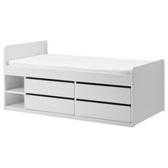 a white bench with two drawers on it