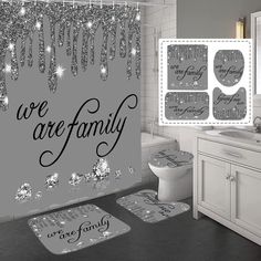 a bathroom decorated in black and white with the words we are family