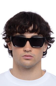 Smooth rectangular frames define these sleek sunglasses fitted with smoky-tinted lenses. 52mm lens width; 20mm bridge width; 145mm temple length 100% UV protection Plastic Imported Men Sunglasses Outfit, Aesthetic Sunglasses Men, Square Sunglasses For Men, Men Sunglasses 2024, Black Rectangular Sunglasses With Tinted Lenses, Black Sunglasses With Tinted Lenses For Square Face, Black Sunglasses With Uv Protection For Square Face, Wayfarer Shield Sunglasses With Tinted Lenses, Black Sunglasses With Tinted Lenses And Square Frame