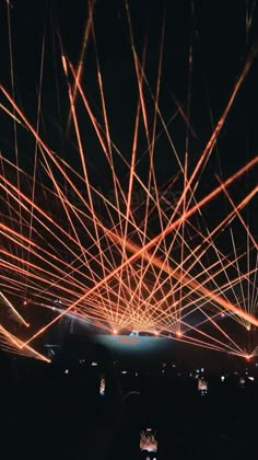 fireworks are lit up in the night sky with long exposure and blurry lines on them