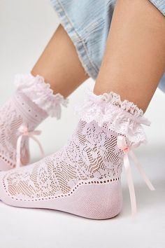 Coquette cool sheer lace socks embellished with tonal ruffles and bow detailing at the ankle. Features Ruffles & bows lace socks Statement sheer lace socks Embellished with tonal ruffles and a bow at the ankle Soft solid knit along the foot for comfort Content + Care 94% Nylon, 6% spandex Hand wash Imported Size + Fit Crew sock length | Ruffles & Bows Lace Sock in Pink, Women's at Urban Outfitters Cute Fun Socks, 1960s Coquette, Girly Socks, Coquette Accessories, Lace Sock, Endless Fashion, Coquette Clothes, Statement Socks, Kawaii Socks