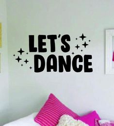 a wall decal that says let's dance with stars in black on it