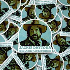 stickers depicting the famous actor jackie dayton are arranged in rows on display