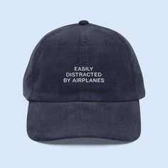 For those who can't help but look up whenever they hear the roar of an engine overhead, the Easily Distracted by Airplanes Corduroy Cap is the perfect match. Whether you're an aviation enthusiast, a frequent traveler, or just someone who loves the thrill of flight, this cap lets everyone know what really captures your attention. 🎨 Designed for Aviation Fans Featuring the fun and relatable Easily Distracted by Airplanes embroidery, this cap is a must-have for anyone with a passion for planes. Th Aviation Gift Ideas, Gifts For Pilots, Airplane Humor, Pilot Hat, Airplane Gifts, Funny Pilot, Corduroy Cap, Frequent Traveler, Easily Distracted