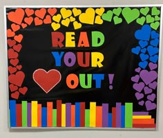 a bulletin board that says read your out with hearts and rainbows in the background