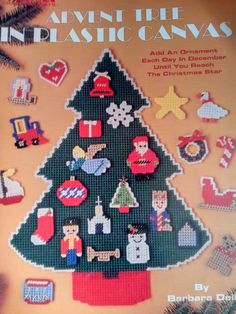 an advertisement for the christmas tree made out of cross stitch