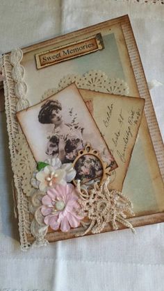 a close up of a piece of paper with flowers on it and an old fashioned photo