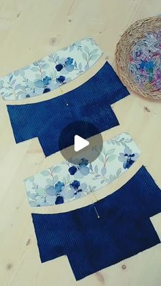 a video demonstrating how to sew an applique with blue flowers and leaves