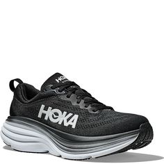 Elevate your running game with these Hoka One One Bondi 8 sneakers. Designed for men with UK shoe size 9.5 and US shoe size 10, these shoes feature a solid black color with a colorful sports theme. The lace-up closure ensures a secure fit, while the cushioned, comfortable, and breathable features make them perfect for gym and training, walking, and running and jogging. Made with a mesh upper material and foam insole material, these shoes are perfect for summer, fall, and spring seasons. The product line is Hoka One Bondi 8, and the style code is 1123202-BWHT. These shoes are suitable for casual wear, activewear, and workwear. Get ready to step up your fitness game with these sleek and stylish sneakers. Brand new with box Running Shoes Black, Workout Games, Hoka One One, Black Running Shoes, Sports Theme, Stylish Sneakers, You Fitness, Shoes Black, Step Up