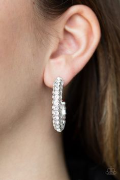 As if rolled in glitter, a shimmery silver hoop is encrusted in row after row of sparkling white rhinestones for a show-stopping look. Earring attaches to a standard post fitting. Hoop measures 1" in diameter. Sold as one pair of hoop earrings. P5HO-WTXX-049XX White Hoop Earrings, Paparazzi Accessories, White Rhinestone, Affordable Jewelry, Paparazzi Jewelry, White Earrings, Dream Jewelry, Rhinestone Earrings, Silver Hoops