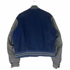 PLEASE ASK ANY QUESTION BEFORE BUYING THIS IS USED CLOTHING PLEASE DONT EXPECTED IT TO BE LIKE NEW OR IN PRISTINE CONDITION Vintage GOLDEN BEAR Varsity Leather Jacket Navy Blue Button Bomber Fine Outer Size Large tag Golden Bear material Wool 100% saiz on tag L (Large) Mesasures About ( Approximately) -Armpit to Ampit : 24 inch -Length (back collar down) : 25 inch Condition : used good condition 7/10 **No Stains And No Hole** **Have a Tears at sleeve see a picture detail** 🎈PLEASE READ THE DESC Blue Varsity Jacket With Button Closure For College, Blue College Varsity Jacket With Button Closure, College Blue Varsity Jacket With Button Closure, Blue Streetwear Outerwear With Button Closure, Urban Blue Outerwear With Button Closure, Blue Buttoned Outerwear For Streetwear, Casual Leather Jacket With Buttons For Streetwear, Blue Winter Varsity Jacket With Button Closure, Blue Varsity Jacket With Button Closure For Winter