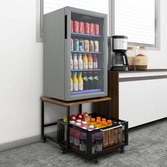 a refrigerator with drinks in it next to a counter