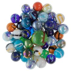 a pile of marbles sitting on top of each other in different colors and sizes