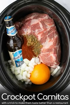 the crock pot contains meat, onions, and beer