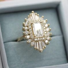 an engagement ring is sitting in a box