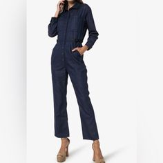 This Blue 3x1 Joelle Denim Jumpsuit Has Been Made In The Usa And Cut In A Relaxed, Straight Leg Silhouette. It Features A Classic Collar, Long Sleeves, Buttoned Cuffs, Chest And Rear Patch Pockets, Adjustable Waist Tabs And Button Fastenings. Nwt. Size Small The Model Is 70.1in Wearing Size Small Bust: 33.5in Height: 70.1in Hips: 35.4in Waist: 23.2” High Rise Cotton Denim Jumpsuit For Work, Workwear High Rise Denim Jumpsuit With Button Closure, Workwear Denim Jumpsuit With Button Closure, Workwear Denim Overall Jumpsuit With Button Closure, Denim Overall Jumpsuit With Button Closure For Work, Denim Blue Workwear Jumpsuits And Rompers With Button Closure, Straight Leg Dark Wash Denim Jumpsuit For Work, Denim Jumpsuit With Button Closure For Work, Straight Leg Cotton Denim Jumpsuit For Work