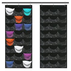 an image of several different colored cups hanging on the wall in front of each other