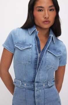 Feel powerful in this stretch-denim jumpsuit with snaps at the waist for a defined look and lots of handy pockets to keep you feeling organized. Front half-zip closure Spread collar Short sleeves Chest flap-patch pockets; front patch pockets; back patch pockets Snap side tabs 72% cotton, 25% recycled cotton, 2% elasterell-p, 1% elastane Machine wash, tumble dry Imported Black Owned/Founded Feel Powerful, Hourglass Silhouette, Body Sculpting, Good American, Free Fabric, Denim Jumpsuit, Second Skin, Recycled Cotton, Snap Button