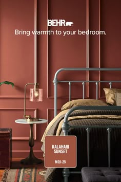 a bedroom with red walls and metal bed frame, along with an advertisement for behr