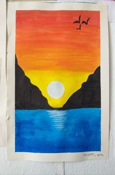 an art project with watercolors on paper