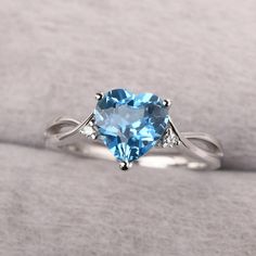 ◆ The ring is handcrafted from sterling silver and decorated with a dazzling 8*8 mm Swiss blue topaz and CZs. It is suitable for engagement/anniversary/daily occasion. ◆ Production Description: Main stone Type: Swiss blue topaz Main Stone Shape: Heart Cut Main Stone Size: 8*8 mm(2.34ct) Side stone: CZ Metal: 925 Sterling silver - Other options available in the drop down menu ◆ Customization: √Free for Add Engraving √Other Metal Type Available √Other Gemstones & Shapes Available √Personalization Pastel Blue Rings, November Birthstone Engagement Ring, Sky Blue Rings, Silver Ring Blue Stone, Blue Diamond Heart Ring For Wedding, Blue Topaz Promise Ring With Accent Stones, Anniversary Blue Topaz Birthstone Ring In White Gold, Light Blue Topaz Ring With Brilliant Cut For Wedding, Light Blue Topaz Wedding Ring With Brilliant Cut