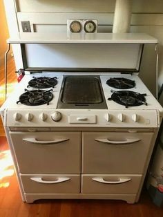 an old fashioned stove with two burners on it