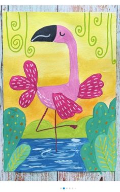 a pink flamingo is standing in the water