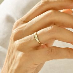 Give a gift they'll be happy with a handmade real solid gold personalized signet ring for a graduation gift The Ring Details ✪ 14k Solid Gold (also in 10k,18k) ✪ Band Options; Solid Yellow Gold, White Gold, Rose Gold ✪ Top Width: 4.60 mm ✪ Bottom Width: 1.08 mm ✪ Thickness: 0.71 mm ✪ Ready to Ship 7 Business Days 🛠 Norm Jewels' pieces are handcrafted by 15-30 years of experienced craftsmen and made to order. 🛠 Note: Engraving is not possible for this item. 🎁 All pieces come in a special turqu Everyday Tiny 14k Gold Rings, Minimalist 14k Gold Filled Stackable Rings For Anniversary, Minimalist 14k Gold Stackable Rings Gift, Simple 14k Gold Engraved Ring For Anniversary, Dainty Everyday Rings Stamped 14k, 14k Gold Engraved Open Ring For Everyday, Classic 14k Gold Filled Midi Promise Rings, Minimalist Recycled Gold Stackable Rings For Anniversary, Classic Midi Rings In Recycled Gold As A Gift