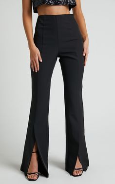 Chic Straight Leg Pants With Side Slits, Elegant Stretch Bottoms With Side Slits, Elegant Bottoms With Side Slits And Stretch, Chic Stretch Bottoms With Seam Detailing, Stretch Bottoms With Side Slits And Straight Leg, Fitted Bottoms With Split Design And Hem, Chic Bottoms With Side Slits, Fitted Bottoms With Split Hem For Fall, Chic Full Length Pants With Side Slits