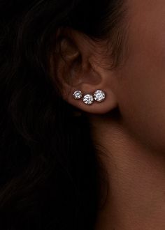 Timeless and versatile, June is the perfect accessory for any occasion. Wear these diamond stud earrings with casual or formal wear to add a touch of sophistication to any outfit. They're true modern heirlooms that will never go out of style, and will be a cherished addition to any jewelry collection.Featuring lab created diamonds and a three prong martini setting. Secure screw back closure.Lab created diamonds.Sold as a pair, including 14k solid gold backings.Diamonds are IGI Certified. Kinn wi Classic White Gold Piercings For Anniversary, Elegant Wedding Ear Climbers With Diamond Accents, Formal White Gold Diamond Ear Climbers, Elegant Wedding Piercings With Prong Setting, Sterling Silver Prong-set Wedding Ear Climbers, Wedding Sterling Silver Ear Climbers With Prong Setting, Sterling Silver Wedding Ear Climbers With Prong Setting, Dazzling Bridal Earrings With Vvs Clarity, White Gold Diamond Ear Climbers With Diamond Accents