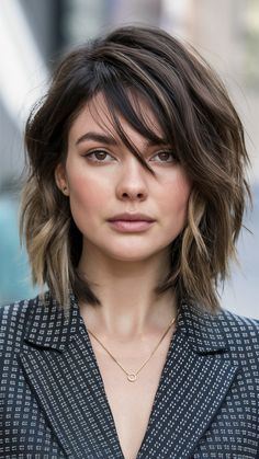 The layered lob (long bob) with curtain bangs is a trendy and versatile hairstyle for medium-length hair. The layers add dimension and movement, while the curtain bangs frame the face, making it perfect for oval, square, and heart-shaped faces. This style is easy to manage and works well with natural textures, giving it a casual yet chic vibe. Layered Lob With Curtain Bangs, Long Bob With Curtain Bangs, Lob With Curtain Bangs, Easy Winter Hairstyles, Bob With Curtain Bangs, Messy French Braids, Long Sleek Hair, Layered Lob, Hairstyles Layered