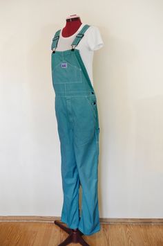 "Item# 230306 I have been dying denim regularly - I just started dying other items like these overalls.  They have been a big hit! ABOUT OVERALLS:  Overalls are loose fitting. The waist measurement is about 1-2 inches larger than what you would normally wear.  Adult Small  32-34\" waist.   Medium 34-36\" waist, l Large 36-38 waist  XL are 38-42 waist.  DETAILS: NEW Painters Overalls \"Rugged Blue\" Brand  100% Cotton  Zipper Fly Dyed  Teal Label Size 32W x 30L Measurements: These \"Rugged Blue\" Painters Overalls, Overall Pants, Green Overalls, Dance Attire, Blue Green Turquoise, Cotton Overalls, Overalls Men, Waist Measurement, Bib Overalls