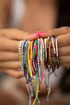 These bracelets are so cute and colorful, sure to give a pop of color to any look. They give a boho vibe and look great dressed up or down. Stack or wear alone. We have so many cute styles, and they makes the perfect gift! Details:       12 styles     Each stack comes with 3 rows of beads     Size is adjustable (7" - 9")     Materials:     Nylon with beads Stacked Boho Bracelets, Turquoise Friendship Bracelets With Tiny Beads For Summer, Summer Friendship Bracelets With Tiny Turquoise Beads, Casual Festival Braided Bracelets With Colorful Beads, Turquoise Friendship Bracelet With Tiny Beads, Turquoise Summer Friendship Bracelet With Tiny Beads, Casual Beaded Wrap Bracelet For Friendship, Casual Colorful Beaded Festival Bracelets, Trendy Adjustable Friendship Bracelets For Festivals