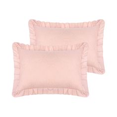 two pink pillows with ruffles on the edges and one pillow has a flower design