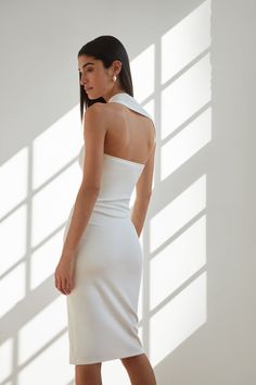 Sleeveless in the City...meet our Manhattan Sleeveless Midi. She's THE dress for both fancy invites or when you just want to look everyday sleek and unique. Fashioned from our soft, mid-stretch European ponte fabric, she features an unforgettable silhouette thanks to her one-shoulder wrap-around neckline and cap sleeve. We hope you're ready for the compliments. [SPLIT] Sam is 5'8" (173 cm) tall, wearing size XS. Total length is approximately 46" (117 cm). European Ponte, also known as Punto di R Caterina Dress, Midi Pencil Dress, Shoulder Wrap, Ponte Fabric, Sleeveless Midi Dress, Reception Dress, Winter Clothing, Midi Dress Sleeveless, Pencil Dress