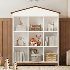 a white book shelf filled with lots of books