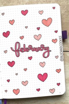 a notebook with hearts on it and the word february written in cursive writing