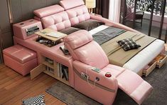 a bed with pink leather furniture in a bedroom