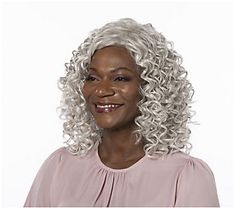 Get noticed in the Toni Brattin Irresistible wig. The shoulder-length layered silhouette boasts stunning allover spiral curls to create natural-looking texture, bounce, and movement. Style curls in smooth spirals or fluffed up for a sassier look.\n\nA specially designed wig cap can be easily adjusted for a custom fit. Additional comfort features include a wide velvet band at the front hairline, open wefting on top, and adjustable sizing tabs in the neckline for a comfortable and secure fit. All