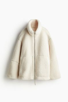 Loose-fit jacket in soft teddy fleece with trim in coated fabric. Stand-up collar  two-way zipper at front  and kangaroo pockets. Lined. Cute Fleece Jacket, Cute Winter Jackets, Fleece Jackets, Cute Coats, Beige Outfit, Teddy Fleece, Soft Teddy, Jumpsuit Men, Cardigan Sweater Jacket