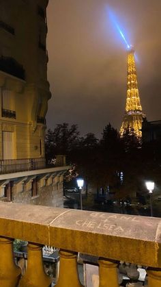 the eiffel tower is lit up at night, and it appears to be very bright