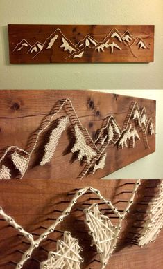 some string art is hanging on the wall next to a wooden sign that says mountains