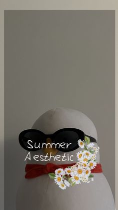 a white vase with flowers on it and the words summer aeshetic written in black