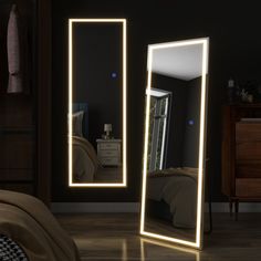 a bedroom scene with focus on the mirror and light reflecting in the room's reflection