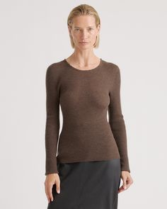 Try on a new level of luxury with our Featherweight Cashmere Ribbed Crewneck Sweater. Crafted to feel light as air without sacrificing warmth, our new fine-gauge featherweight cashmere styles are knit using a longer fiber length, making them more resistant to pilling and luxuriously soft. The delicate ribbed texture and seamless construction elevate this fitted crewneck silhouette, making it the updated classic you'll turn toward again and again.  | Quince | Women's Featherweight Cashmere Ribbed City Rain, Navy And Copper, Taupe Sweater, Cashmere Outfits, Hairstyle Tutorials, Leather Jacket With Hood, Cashmere Sweater Women, Womens Cashmere, Yarn Sizes