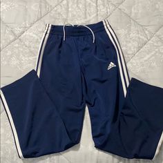 Never Worn Navy Blue With White Stripe Boys Track Pants. Adidas Blue Sweatpants For Sports, Adidas Blue Sporty Sweatpants, Adidas Sporty Blue Sweatpants, Blue Adidas Cotton Sweatpants, Adidas Blue Cotton Pants, Adidas Blue Cotton Sweatpants, Adidas Blue Sweatpants With Pockets, Blue Adidas Sweatpants With Pockets, Adidas Blue Sweatpants