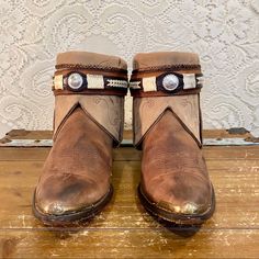 Handcrafted Brown And Beige Nocona Western Cowgirl Ankle Booties Women’s Size 8 1/2 M. I’ve Taken A Pair Of Vintage Nocona Cowgirl Boots Antiqued Them And Have Added Beige Embroidered Tops And A Western Belt. One Of A Kind And Sure To Turn Heads. Handmade And Vintage Items Will Not Be Perfect But I Try To Capture Any Flaws In Photos Tag: Nocona Size 8 1/2 M Heel To Toe: 11” Heel: 2” Height: 6” Ball: 3 1/2” Western Style Brown Leather Booties, Brown Leather Western Booties, Brown Western Booties With Snip Toe, Western Style Brown Ankle Booties, Western Brown Booties With Round Toe, Brown Western Booties With Round Toe, Western Brown Ankle-high Booties, Nocona Boots, Ankle Cowboy Boots